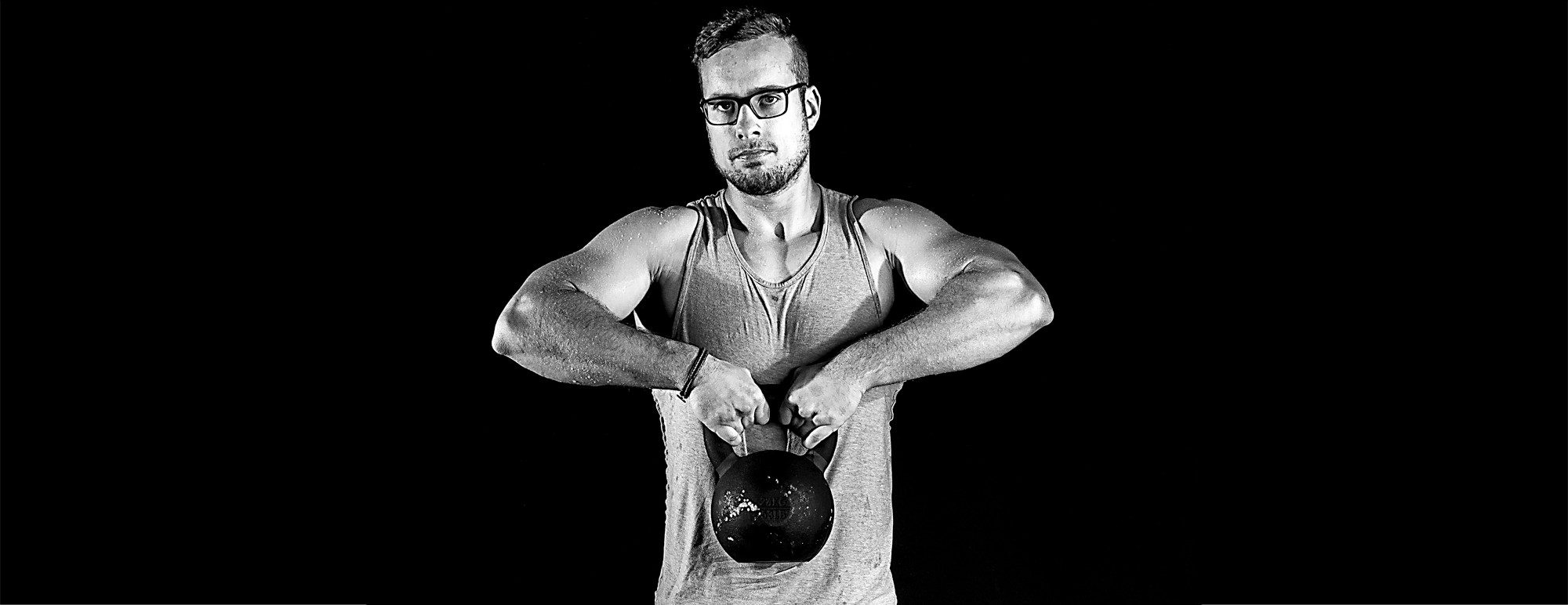 Smart Fitness member training with a kettlebell